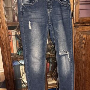 Distressed Blue Denim Jeans